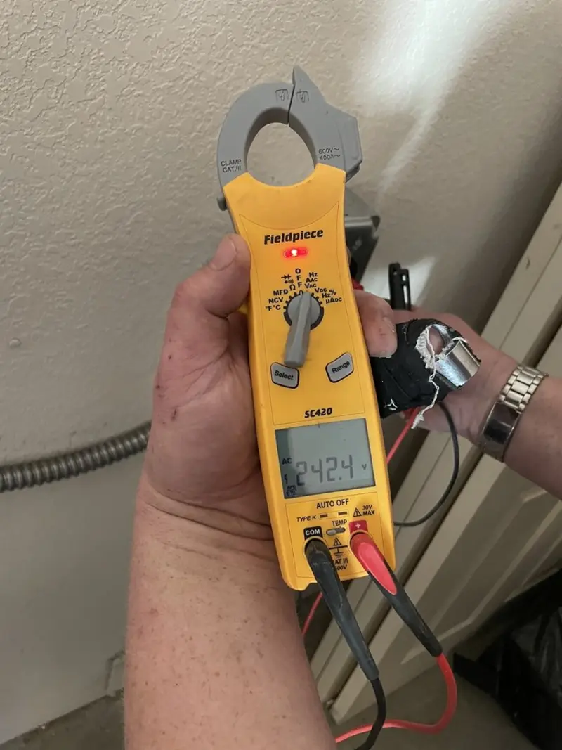 Voltage testing with clamp meter during Generator Installation in Ridgefield